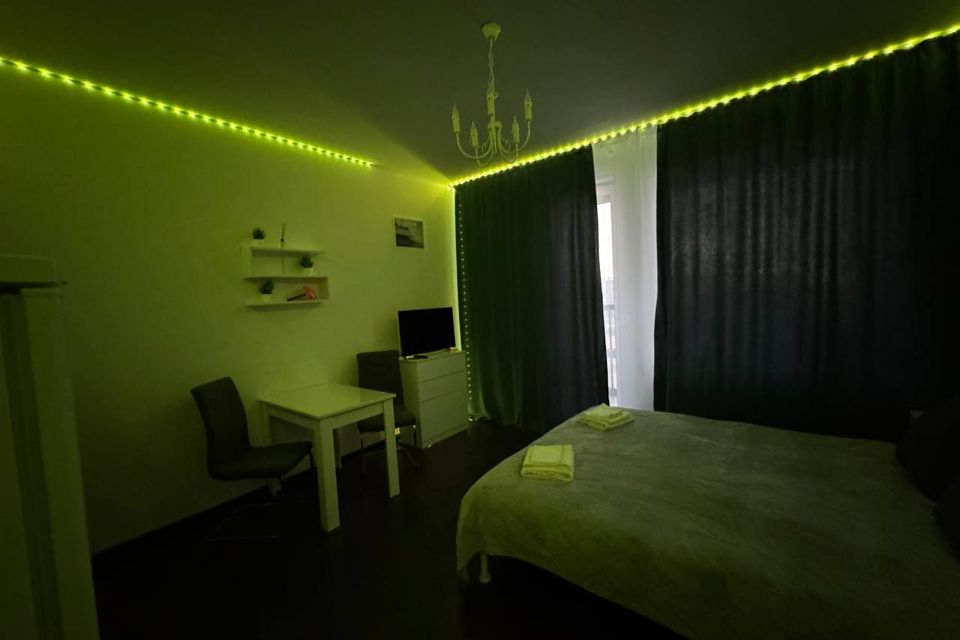 Стильная квартира студия на 8 этаже с неоновой подсветкой.