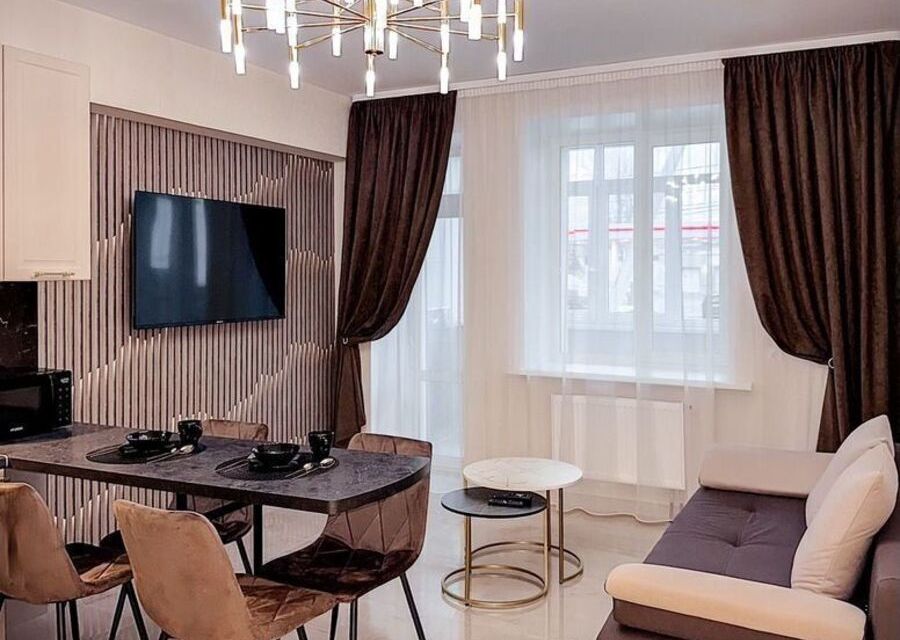 Однoкомнатнaя квapтирa c cовмeщeннoй куxней-гоcтиной