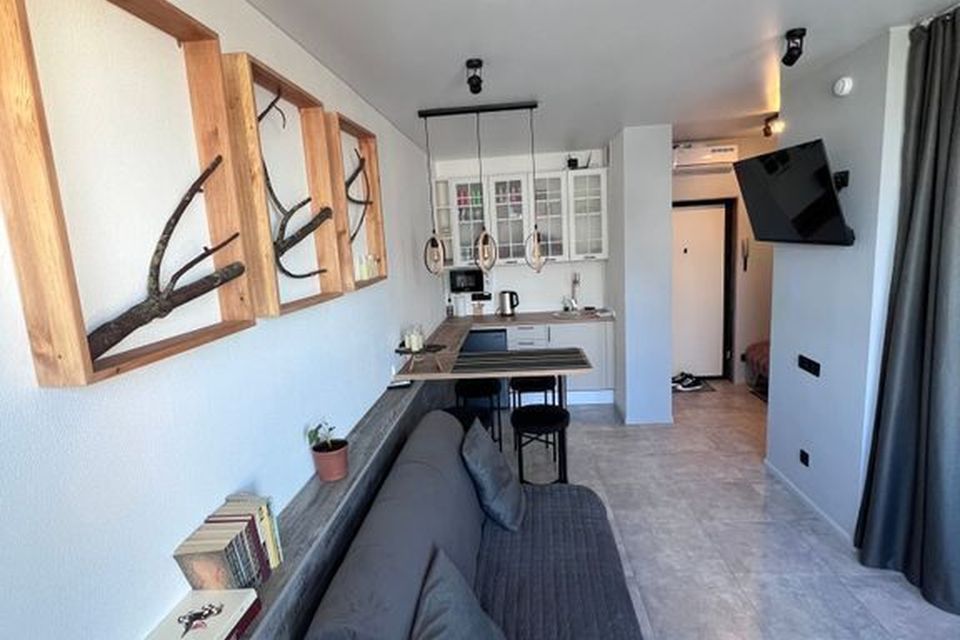 Уютная квартира с панорамным окном на 14 этаже