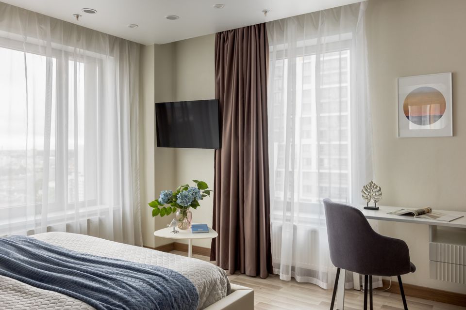 Просторный апартамент с 2 окнами и массажным столом 