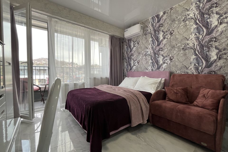 Студия Фуксия у моря с бассейном