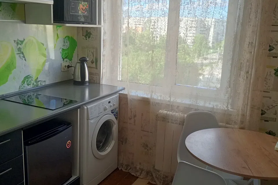 Уютная квартира с видом на кольцо обозрения.