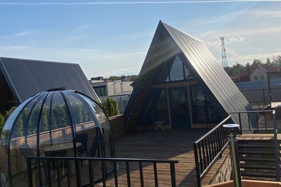 Дом с террасой и видом на лесной массив