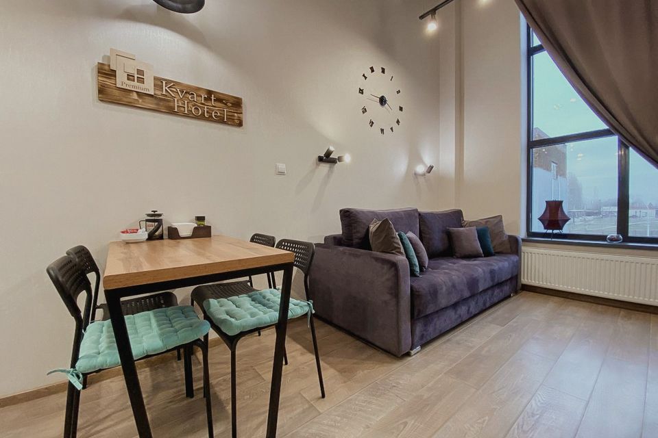 Современные двухуровневые апартаменты с панорамными окнами