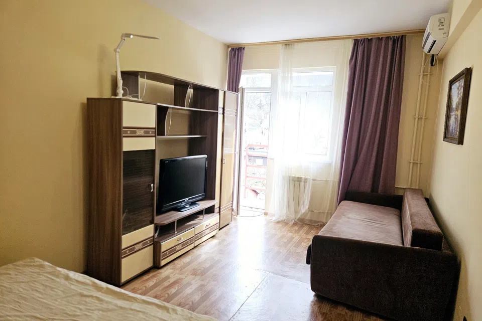 Апартаменты Golden Holiday  Стандарт- спальня, кухня, балкон