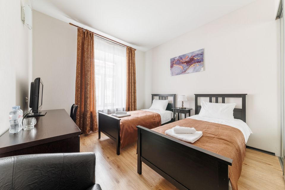 Уютный номер с двумя раздельными кроватями