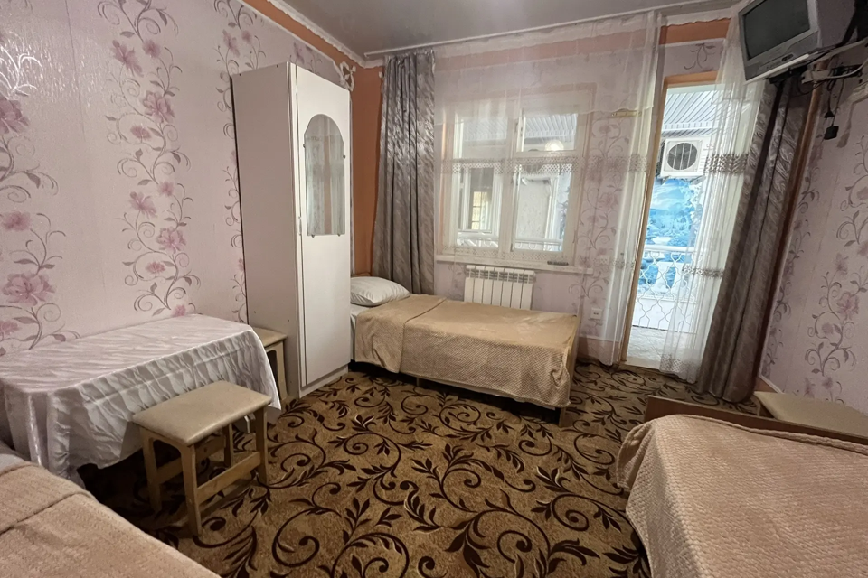 
Комната у моря 7
