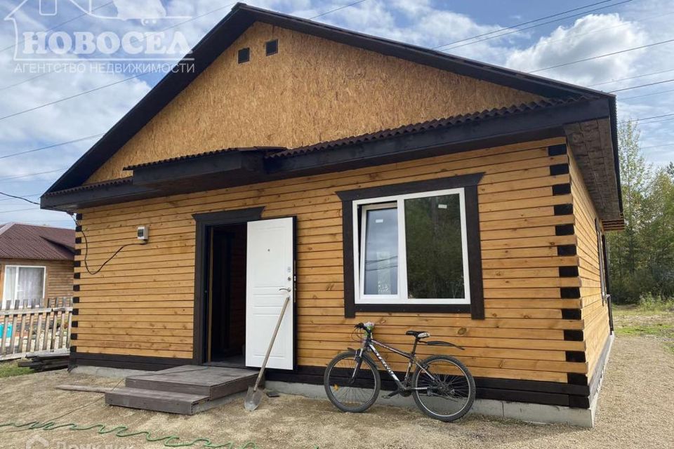 Стоимость покраски деревянного дома