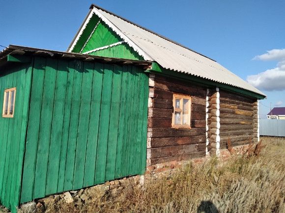 Бюджетный вариант гаража из шпал