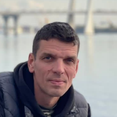 Александр Васильев